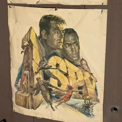 Sale Photo Thumbnail #343: Vintage 1960s I Spy television show poster pinned to a wall, featuring portraits of Robert Culp and Bill Cosby above action scenes.
