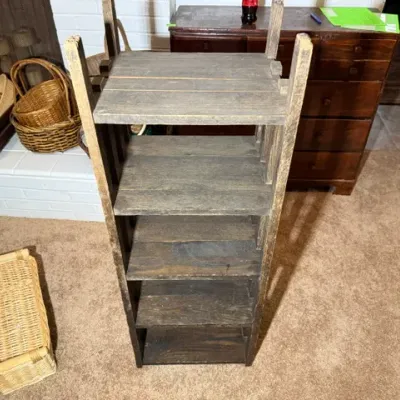 Sale Photo Thumbnail #346: Rustic, weathered wooden multi-tier shelving unit, perfect for storage or display in a primitive or farmhouse decor style.