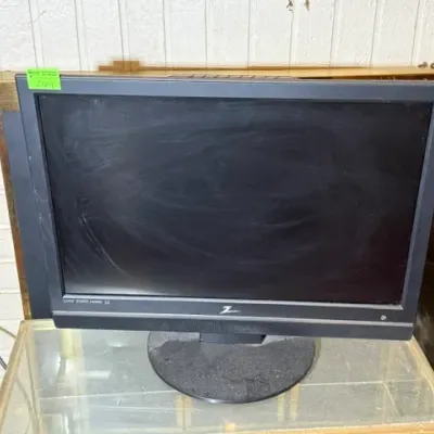 Sale Photo Thumbnail #260: Black Zenith LCD flat screen computer monitor or small television, showing smudges and light surface wear.