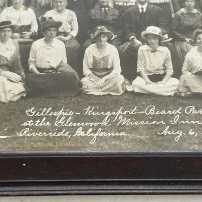 Sale Photo Thumbnail #186: Framed black-and-white group portrait photograph titled "Gillespie - Kingsport - Beard Party at the Glenwood Mission Inn, Riverside, California, Aug. 6, 1915."