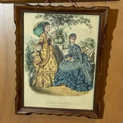 Sale Photo Thumbnail #131: Framed vintage fashion plate print from La Mode Illustrée depicting Victorian women's dresses, housed in a carved wooden frame.