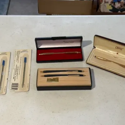 Sale Photo Thumbnail #230: Collection of Cross fine writing instruments, including boxed pen and pencil sets and two blister-packaged refills.