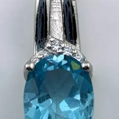 Oval Cut Topaz Sterling Silver Pendant
