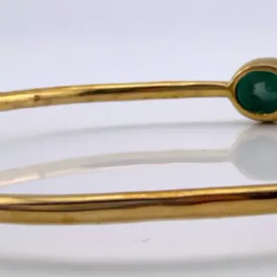 3 Stone Emerald Gold Tone Bangle Bracelet