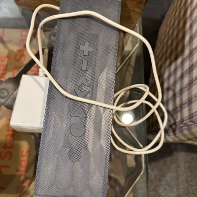 Sale Photo Thumbnail #55: Jawbone Big Jambox portable Bluetooth speaker in graphite, complete with its power adapter cable.