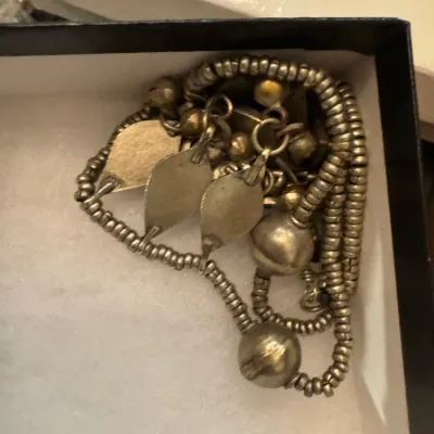 Sale Photo Thumbnail #16: Vintage tribal style silver-tone beaded necklace with leaf dangles and bell-like charms, presented in a gift box.