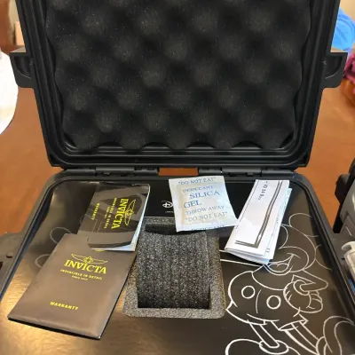 Invicta Disney Limited Edition watch case with original paperwork and foam inserts, missing the watch.