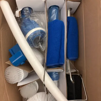 Boxed electric scrubber tool set with various interchangeable brush heads, extensions, and microfiber covers.