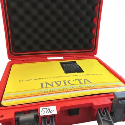 Invicta bright red heavy-duty watch collector storage case featuring egg-crate foam lining and front latches.
