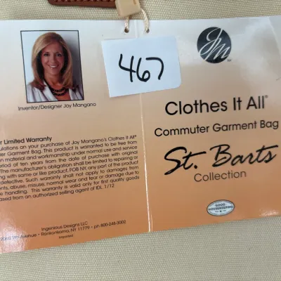 Original paper tag for a Joy Mangano "Clothes It All" commuter garment bag from the St. Barts Collection.