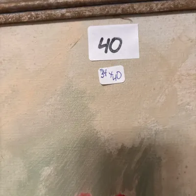Framed oil painting featuring red floral elements, housed in a molded gilt frame and labeled with dimensions of 34 by 40 inches.
