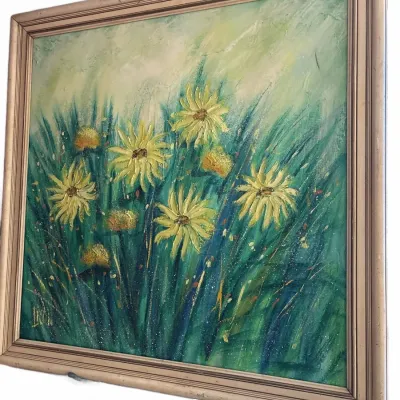 Mid-century impasto oil painting on canvas featuring yellow floral blooms, signed lower left and set in a vintage molded wooden frame.