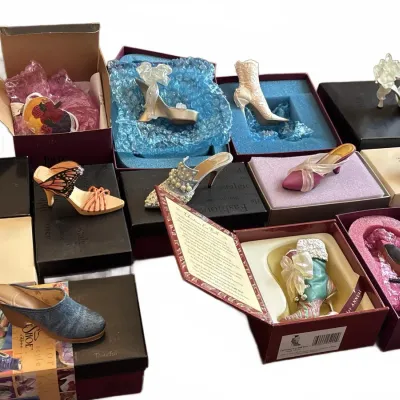 Collection of decorative miniature shoe figurines from Just the Right Shoe by Raine, mostly complete with original display boxes.