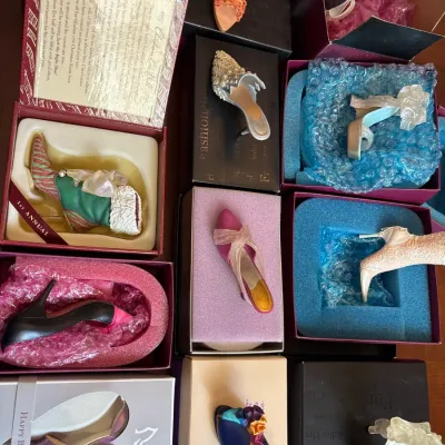 Collection of assorted miniature shoe figurines, including Just the Right Shoe collectibles, displayed in their original boxes.