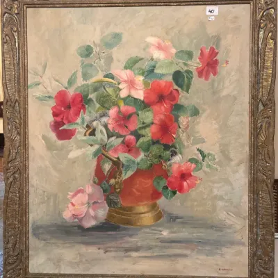 Framed vintage floral still life oil painting depicting red and pink hibiscus blossoms, signed E. Vingrig, set in an ornate carved wood...