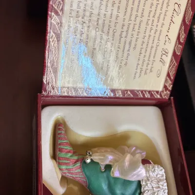 RAINE Just the Right Shoe 'Christmas Eve Ball' high-heeled bootie figurine, nestled in its original storybook box packaging.