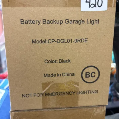 Boxed Battery Backup Garage Light in black, model CP-DGL01-9RDE.