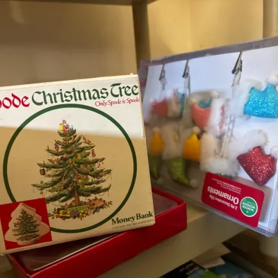 Spode Christmas Tree money bank in its original box, displayed next to a package of Winter Wonder clip ornaments.