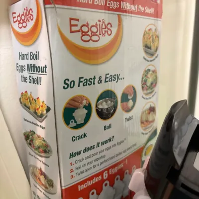 Vintage 'As Seen on TV' Eggies hard-boiled egg cooking set in its original retail packaging.