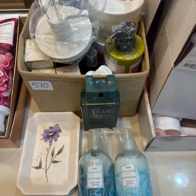 Collection of bath, body, and fragrance items including Van Cleef & Arpels Tsar eau de toilette, Bucaneve liquid soap and hand cream,...