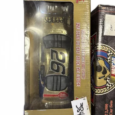 Racing Champions NASCAR Gold Commemorative Series 1:24 scale #26 Cheerios die-cast stock car replica in original display box.