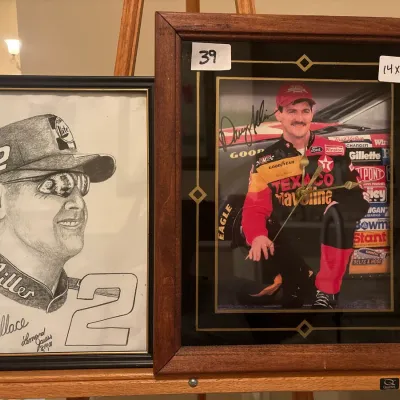 Two framed NASCAR collectibles, including a signed pencil sketch of Rusty Wallace and a Dave Allison Texaco Havoline framed photo clock.