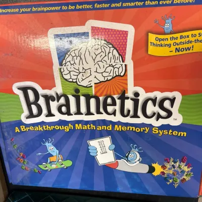 Brainetics Math and Memory System educational game box showing light surface wear and minor scuffing.