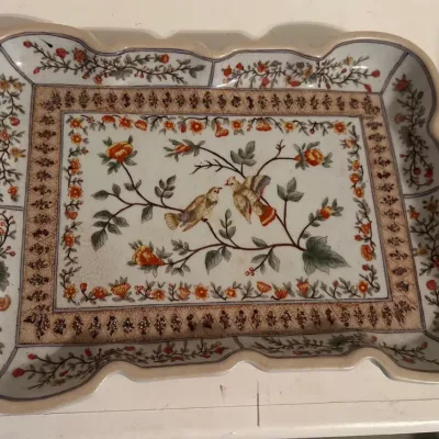 Vintage rectangular ceramic tray with a scalloped edge, decorated with a central bird and floral motif in a Chinoiserie style.