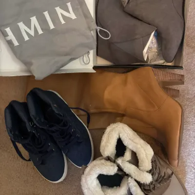 Collection of women's shoes and boots, including gray suede wedge booties in a shoe box with dust bag, tan leather high-heeled...
