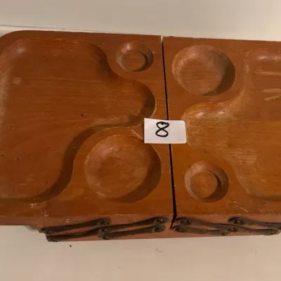 Vintage mid-century wooden cantilever sewing box or caddy featuring carved tray compartments and metal side hinges, showing light wear.
