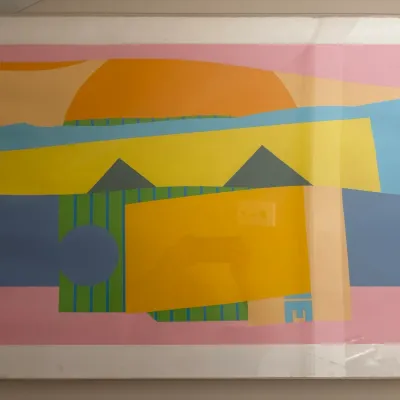 Framed mid-century style abstract geometric art print featuring bold shapes in pink, orange, yellow, and blue, measuring 30x24 inches.