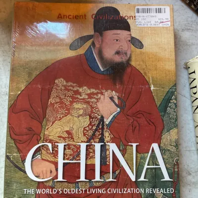 Large format history book titled "China: The World's Oldest Living Civilization Revealed," published by Thames &...