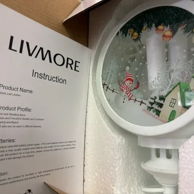 Livmore brand plastic LED holiday lantern, in original box with instruction sheet.