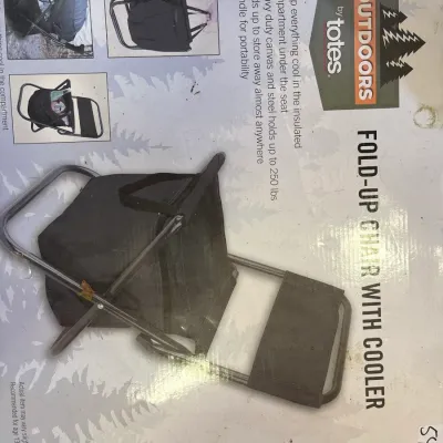 Outdoors by Totes fold-up chair with built-in cooler compartment, packaged in its original box.