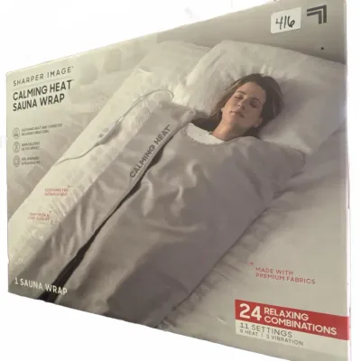 Sharper Image Calming Heat Sauna Wrap in original retail box, featuring soothing infrared heat and vibration settings.