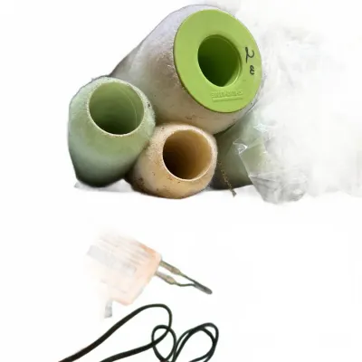 Assorted paint roller covers including a Shur-Line brand cover, shown alongside a small electrical cord assembly.
