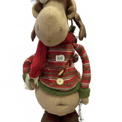Whimsical plush Christmas moose figurine dressed in a red and green striped sweater, scarf, and winter hat.