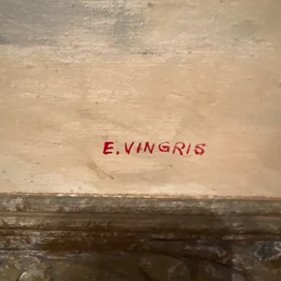 Close-up of artist signature 'E. Vingris' in red paint on a framed canvas artwork.