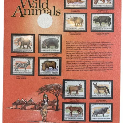 Postal Commemorative Society "Wild Animals" display page featuring ten unused postage stamps from Burundi depicting African...