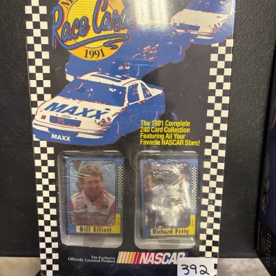 Sealed 1991 MAXX Race Cards complete 240-card NASCAR collection box, featuring Bill Elliott and Richard Petty visible on the front display.