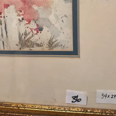 Framed floral watercolor painting signed by artist Beth Eidelberg, measuring 34x29 inches in a gold-finished wood frame.
