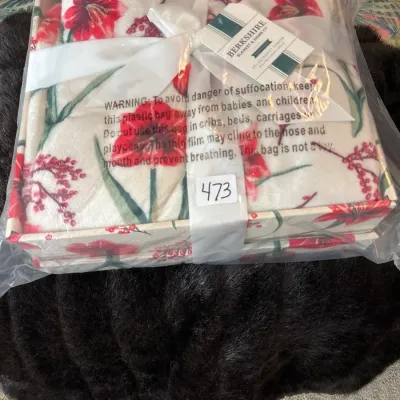 New in original packaging Berkshire Blanket & Home Co. VelvetLoft oversized throw featuring a red floral pattern.