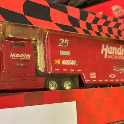 NASCAR Hendrick Motorsports Racing die-cast #25 semi-truck and trailer model in original box.