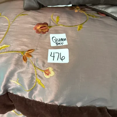 Queen-size embroidered bedding set in shades of taupe and brown, featuring floral vine details.