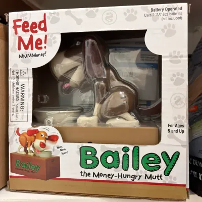 New-in-box "Bailey the Money-Hungry Mutt" battery-operated novelty coin bank.