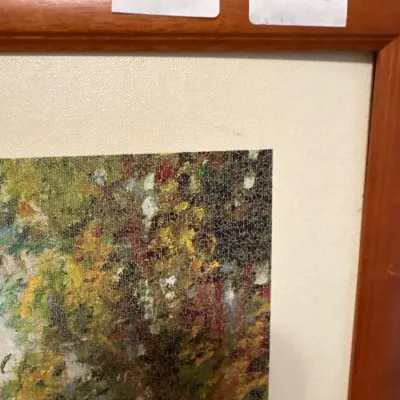 Close-up of a framed impressionist-style art print in a wood frame with cream matting, tagged for lot 38 and measuring 30 by 23 inches.