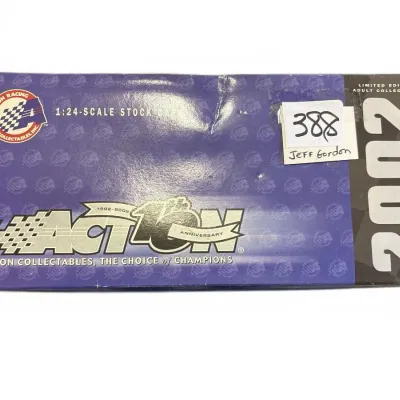 Action Racing Collectables 2002 Jeff Gordon 1:24 scale die-cast stock car in its original box.