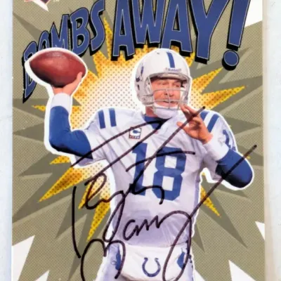 Autographed Peyton Manning Upper Deck First Edition "Bombs Away!" trading card featuring the Indianapolis Colts quarterback.