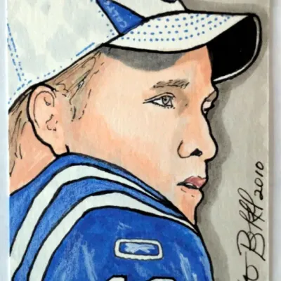 Hand-drawn Peyton Manning artist sketch card depicting him in an Indianapolis Colts jersey and hat, signed and dated 2010.