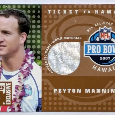 2007 Topps TX Exclusive Peyton Manning Ticket to Hawaii trading card featuring an embedded authentic game-worn jersey swatch.